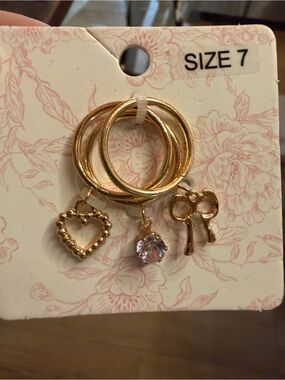 Francesca's Collections Gold Stackable Charm Ring Set with Heart, Crystal & Bow